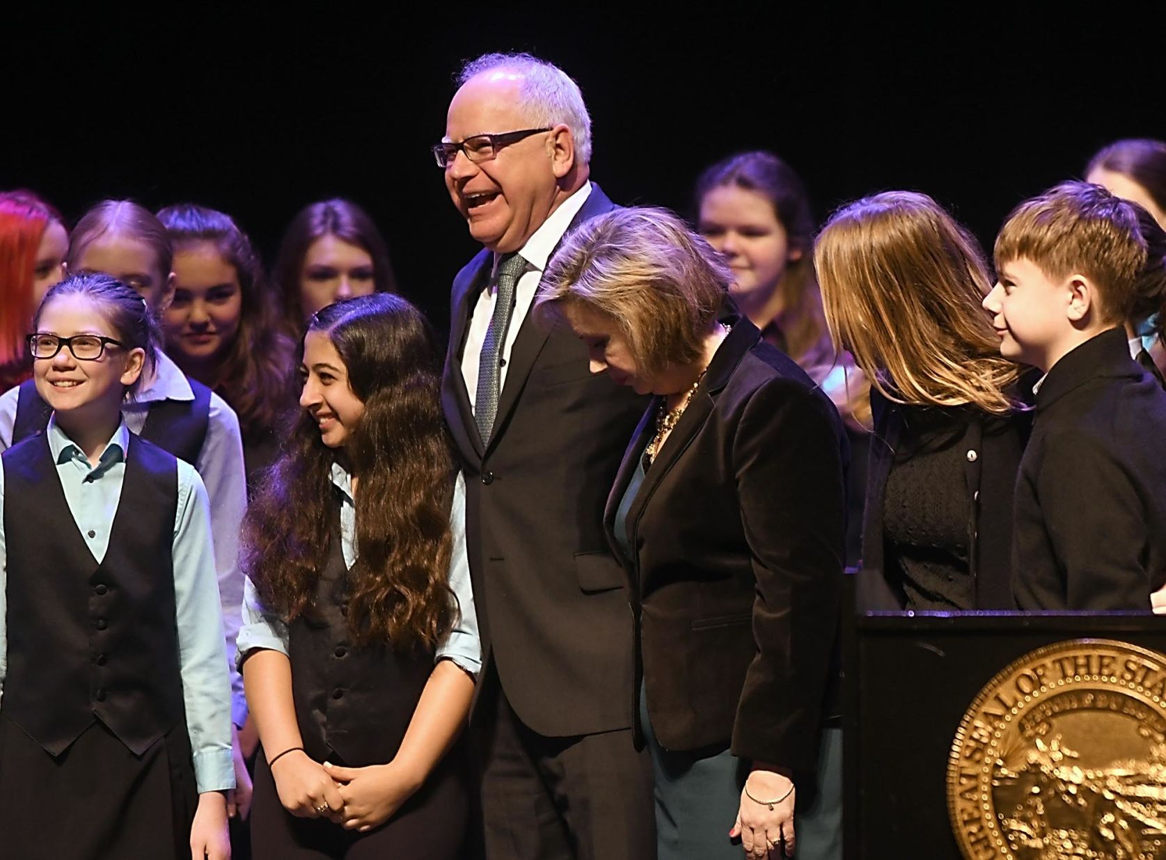 Walz poses with choir before swearing in